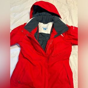 Red skiing jacket or winter jacket